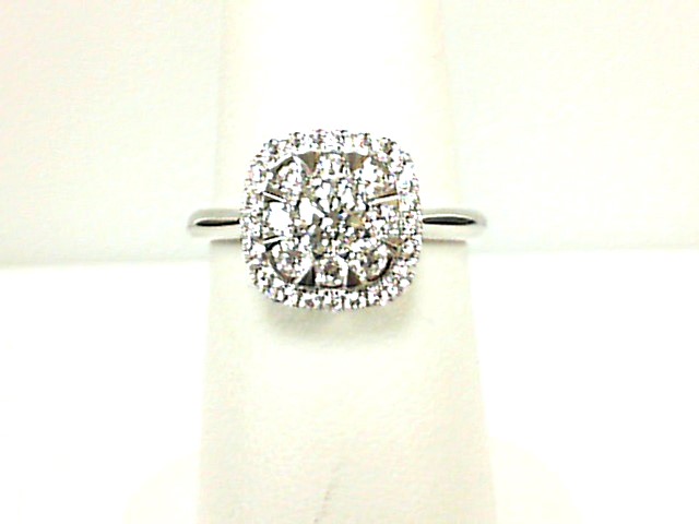 Forevermark 18 Karat White Gold Ring With One 0.23Ct Forevermark Round H Si1 Diamond And 32=0.40Tw Round (not Forevermark) Diamonds
FM 7377386