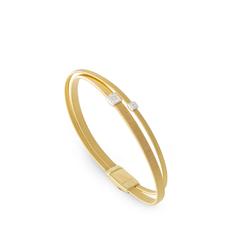 Marco Bicego 18K Yellow Gold Masai 2-Strand Coil Bracelet With Diamonds  
Diamonds total carat weight: 0.10
Length: 6.75 Inch