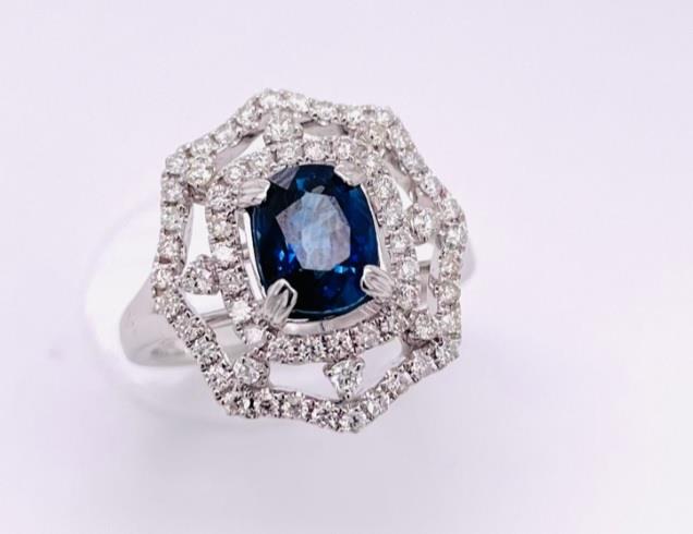 14 Karat White Gold Art Deco Style Ring With One 1.86Ct Cushion Cut Sapphire And 0.60Tw Round Diamonds 
Ring Size: 7