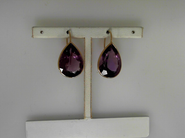 14kt Yellow Gold  Bezel Set With 2=18X12  Pear Shape Amethysts Earrings

Please Keep In Mind That When Buying Estate Items You Are Purchasing Something That Is Pre-Loved.  Most Estate Items Show Signs Of Wear, But That Is Also What Makes Them So Unique.