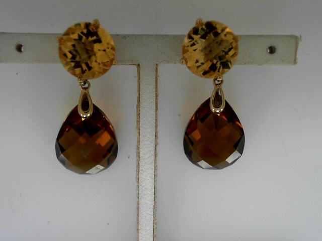 14 Karat Yellow Gold Citrine and Smokey Quartz  Dangle Earrings

Please Keep In Mind That When Buying Estate Items You Are Purchasing Something That Is Pre-Loved.  Most Estate Items Show Signs Of Wear, But That Is Also What Makes Them So Unique.  We Do