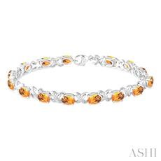 Sterling Silver Oval Shape Gemstone & Diamond Bracelet
7x5 MM Oval Cut Citrine and 1/20 Ctw Round Cut Diamond Fashion Bracelet 7 inch