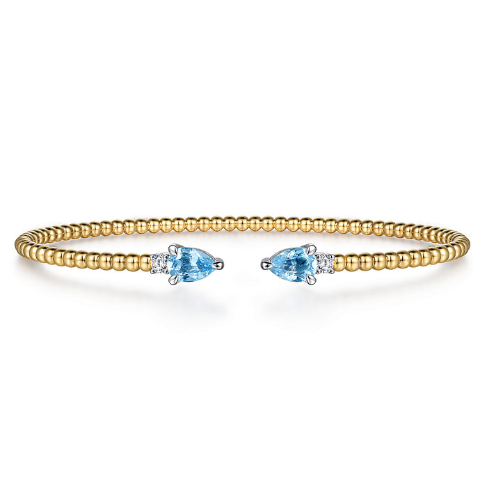 Gabriel & Co 14K White & Yellow Gold Bujukan Open Cuff Bracelet with Blue Topaz and Diamond End Caps
Blue Topaz 0.92ctw
Diamond 0.09ctw