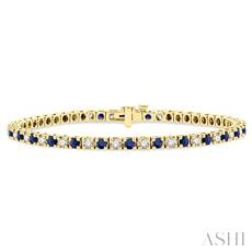 14 Karat Yellow Gold 2.5 Mm Sapphire And 1.50 Ct Diamod Line Bracelet 7 Inch