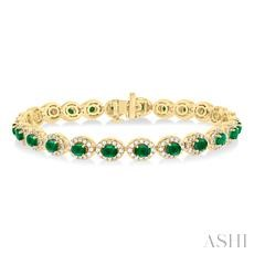 14 Karat Yellow Gold 4 X 3 Oval Emerald And 2.15 Ct  Diamond Halo Bracelet 7 Inch