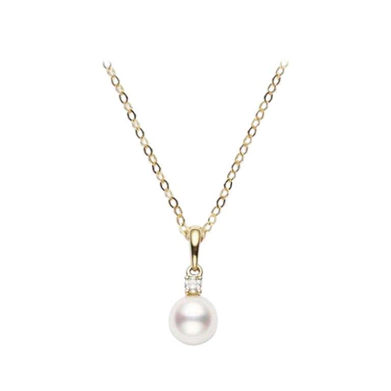 Mikimoto 18 Karat Yellow Gold Pendant With One 7 x 7.5 mm Akoya Pearl And One 0.05Ct Round Diamond 18 Inch Length