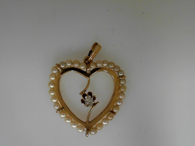 14 Karat  Yellow Gold Heart Pendant Seed Pearl and Euro Diamond
Length: no chain