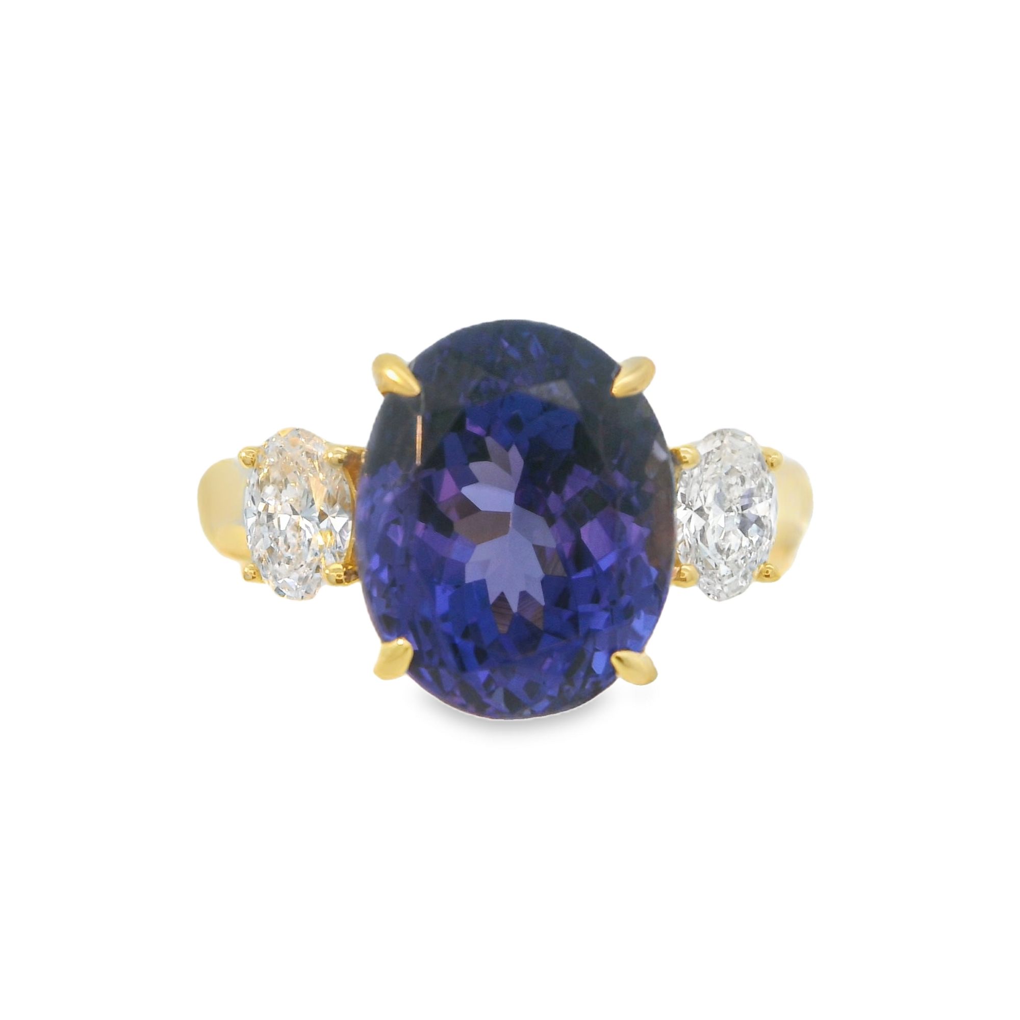 18ky Tanzanite and Diamond Three Stone Ring  T=5.50cttw D=.48cttw