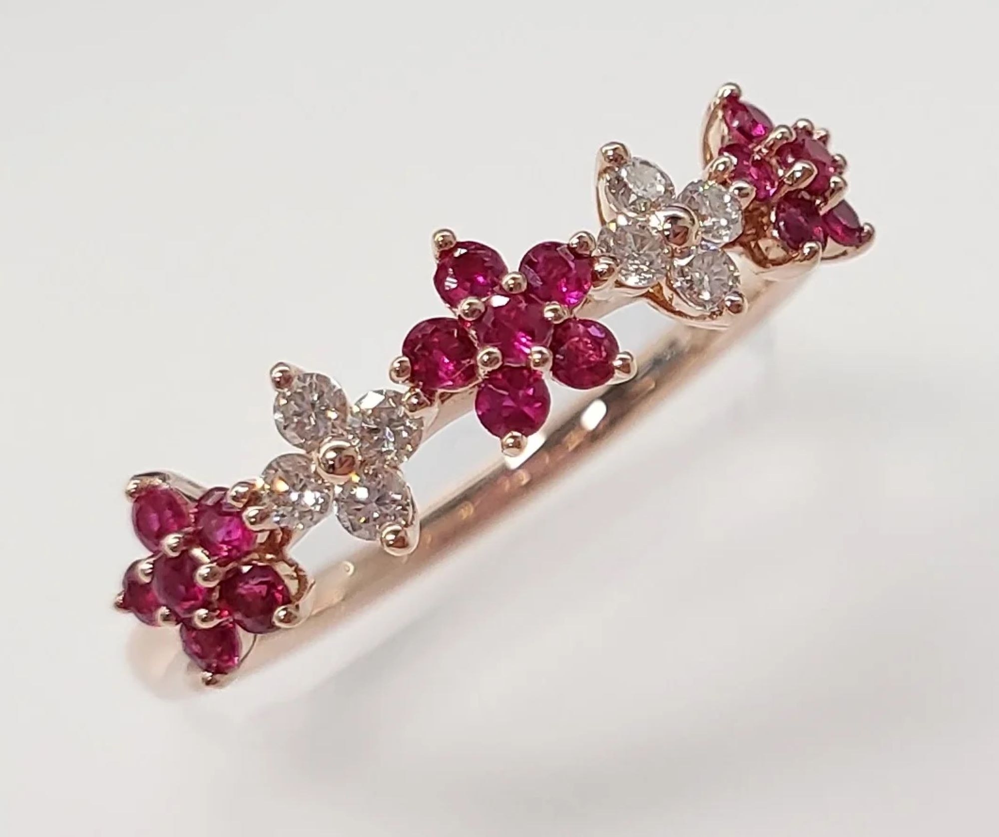 14KRG  RUBY&DIA FLOWER RING D=.16