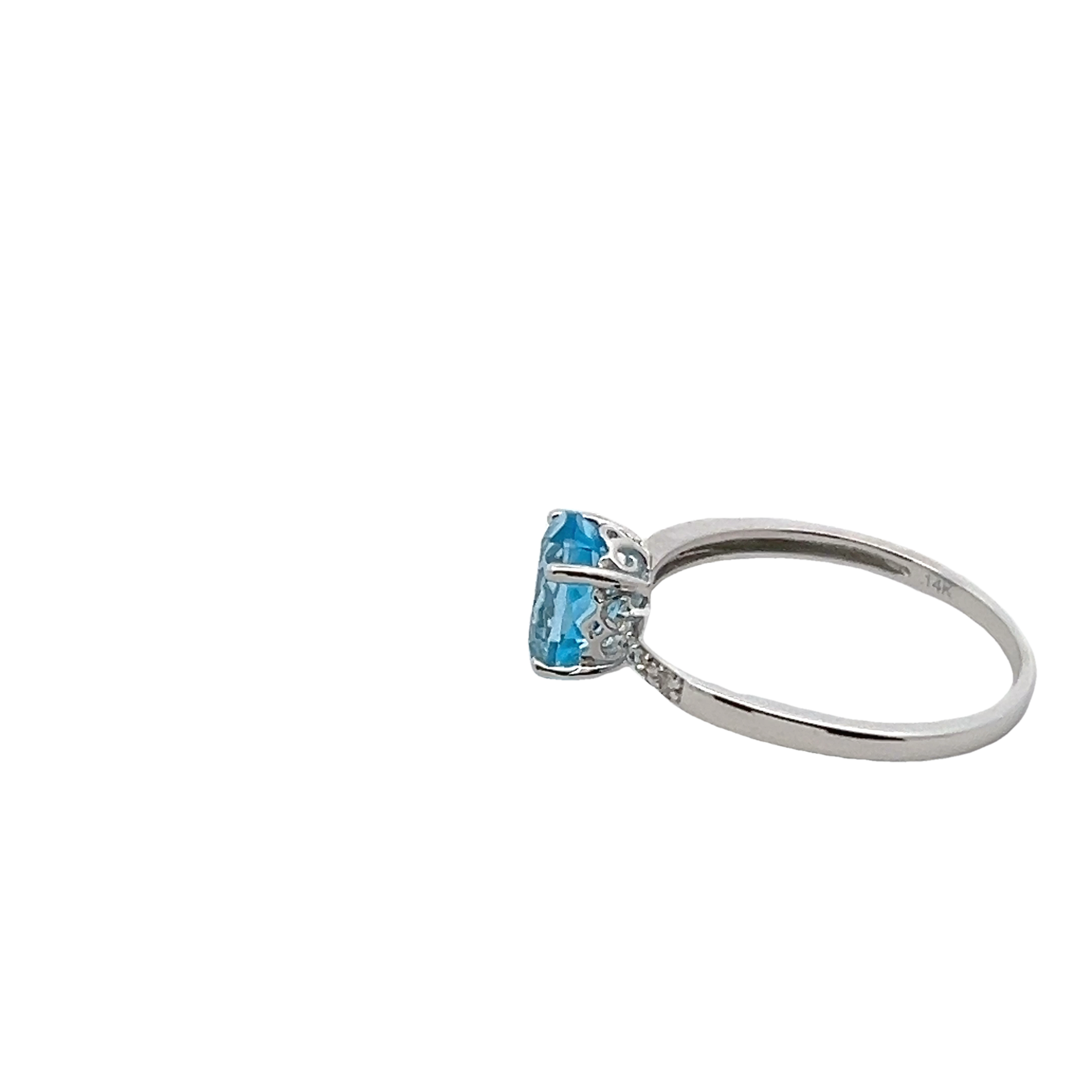 14k White Gold Diamond And Blue Topaz Ring