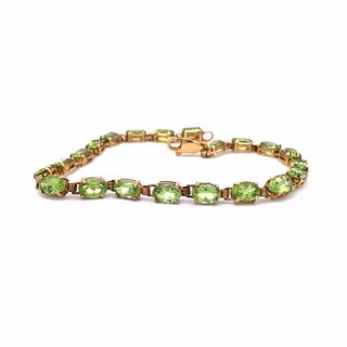 Lady's Yellow 14 Karat Link Bracelet Length 7 With 20= Oval Peridots