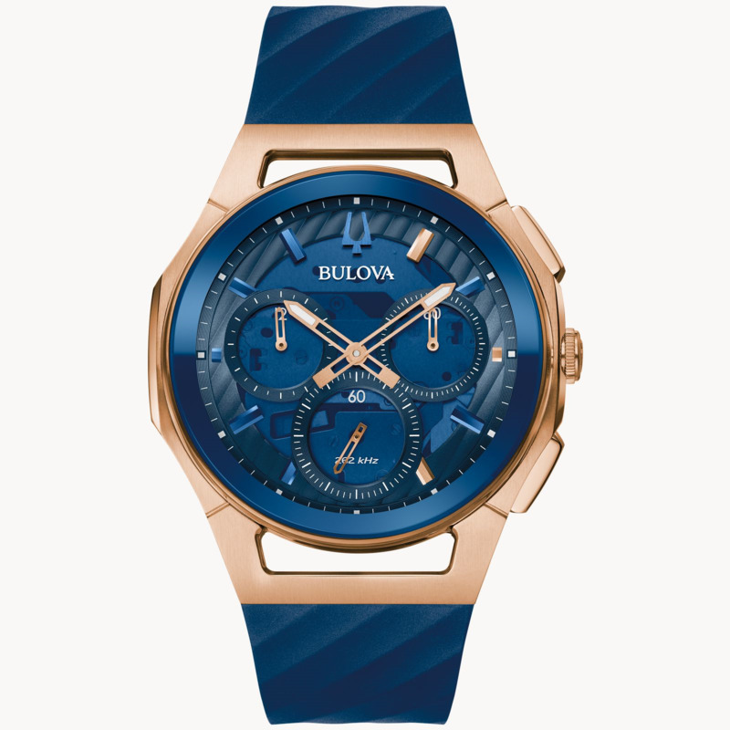 GENTS BULOVA CURV WATCH ROSE TONE STAINLESS STEEL CASE WITH BLUE DIAL AND BLUE SILICONE STRAP