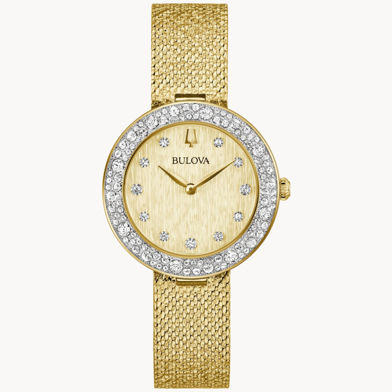 LADIES BULOVA CRYSTAL WATCH WITH GOLD TONE STAINLESS STEEL CASE  GOLD TONE TEXTURED DIAL WITH CRYSTAL ACCENTS  CRYSTAL SET BEZEL  AND MESH TEXTURED BRACELET STRAP