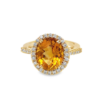 14K YELLOW GOLD HALO ESTATE RING SIZE 8.25 WITH ONE 5.CT OVAL CITRINE AND 35=0.35TW ROUND H-I SI1-SI2 DIAMONDS TOTAL GRAM WEIGHT: 4.145 (ESTATE ITEM:  ALL SALES FINAL  AS IS  NO WARRANTY)