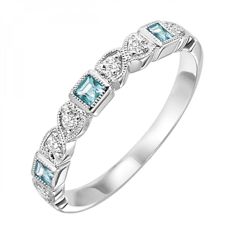 10 KARAT WHITE GOLD STACKABLE RING SIZE 7 WITH 6=0.09TW ROUND I COLOR I1 CLARITY DIAMONDS AND 3=0.23TW PRINCESS BLUE TOPAZS   (1.43 GRAMS)