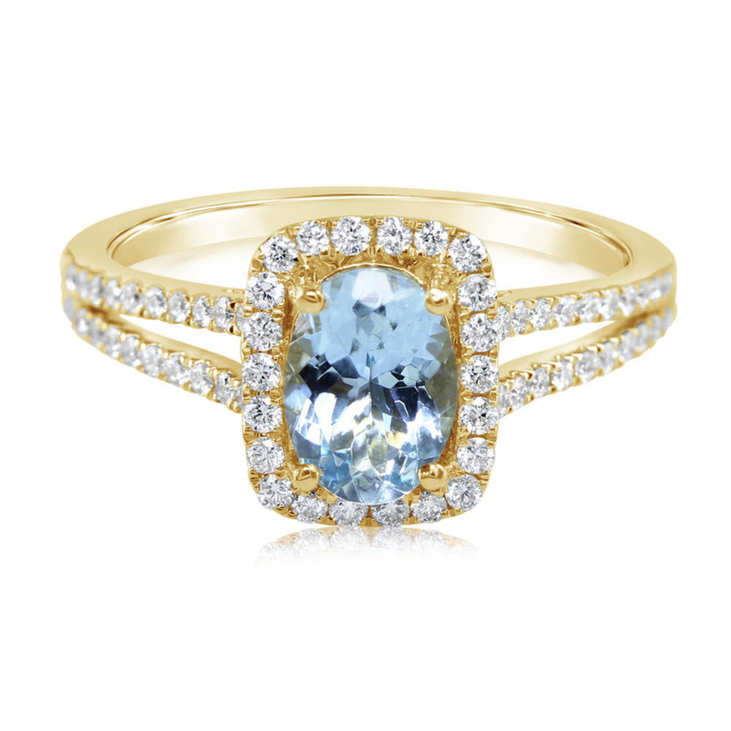 14K YELLOW GOLD HALO RING SIZE 7 WITH ONE 0.90CT OVAL AQUA AND 62=0.35TW ROUND G-H SI1 DIAMONDS   (3.14 GRAMS)
