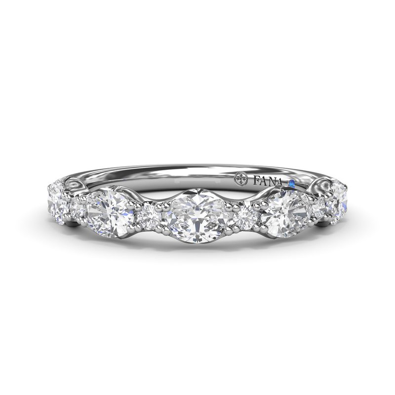 PLATINUM SCALLOPED DIAMOND WEDDING BAND SIZE 6.5 WITH 5 = 0.24TW OVAL F-G VS2-SI1 DIAMONDS AND 6 = 0.12TW ROUND F-G VS2-SI1 DIAMONDS AND ONE 0.01TW ROUND BLUE SAPPHIRE   (4.17 GRAMS)