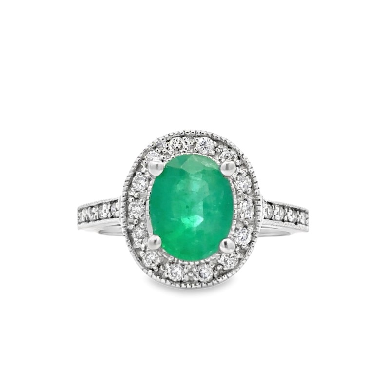 Oval Emerald And Diamond Halo Ring