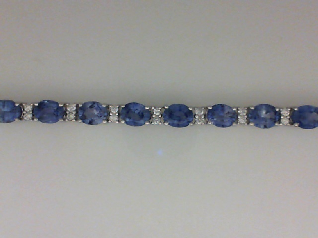 14K WHITE GOLD IN LINE BRACELET WITH 14.73CTTW OVAL CEYLON SAPPHIRES WITH .77CTTW ROUND SI CLARITY & G COLOR DIAMONDS